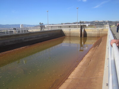 Challenges 4 - Sludge in Bottom of Drained WW Basin_tinified